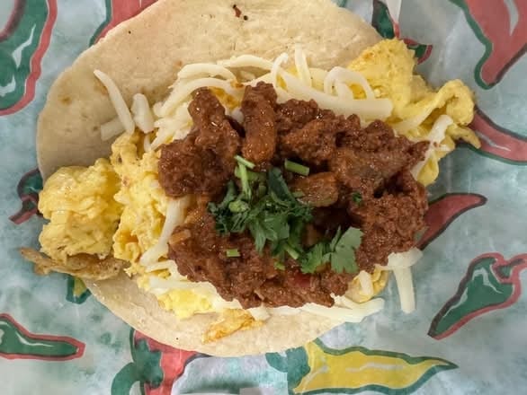 Egg & Cheese Taco with Brisket.